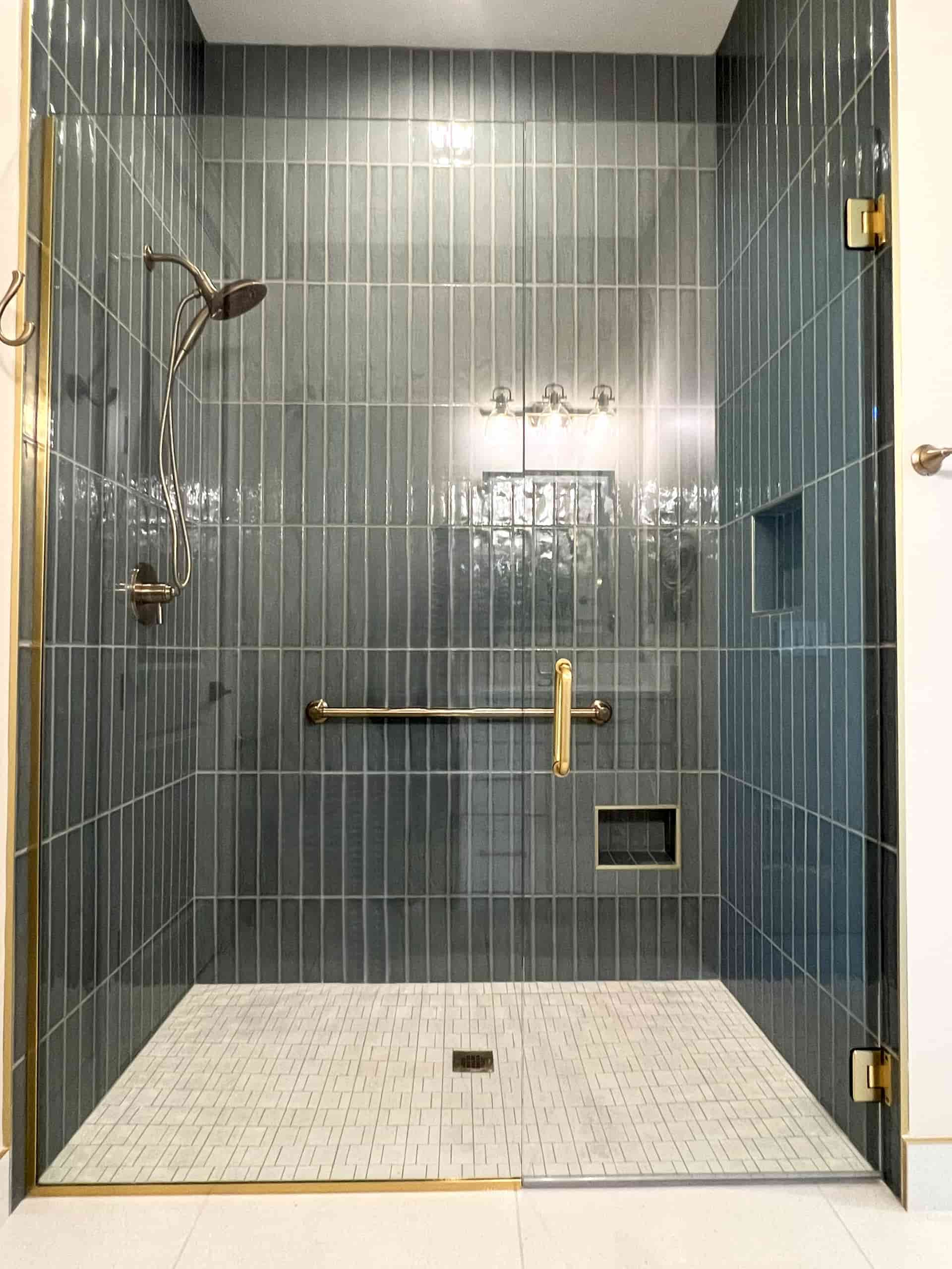 Luxurious bathroom with modern tile and fixtures